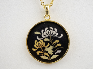 lot 200 image: Gold-Tone Pendant Necklace with Floral Enamel Medallion