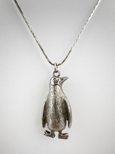 lot 204 image: Silver Penguin Pendant Necklace.