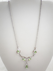 lot 207 image: Sterling Silver Necklace with Green Gemstones.