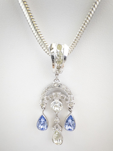 lot 212 image: Sterling Silver Pendant Necklace with Blue and Clear Gemstone Drops