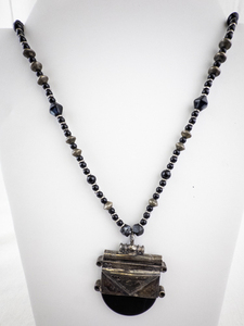 lot 217 image: Tribal Style Beaded Necklace with Large Ornate Pendant