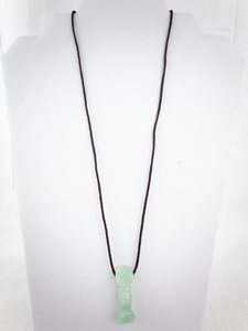lot 225 image: Green Jade Tiki Pendant Necklace on Black Cord