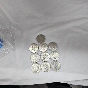 lot 68 image: Lot of 10 Ikes $1 Coins, 71,71,72,74,77,77,78,76,76,76