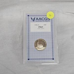 lot 11 image: 1986 S AACGS PR65 50c