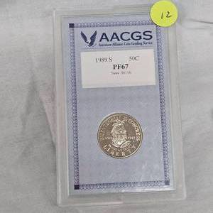 lot 12 image: 1989 S AACGS PF67 50c