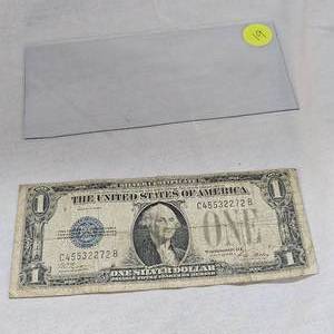 lot 19 image: 1928 A $1 Silver Certificate, Funny Back