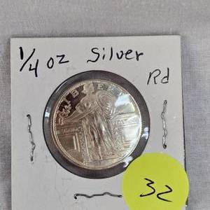 lot 32 image: 14 oz Silver Round Standing Liberty