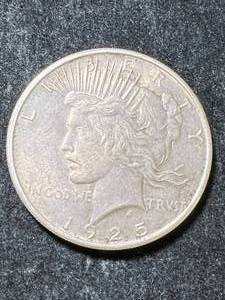 lot 20 image: 1925 US PEACE SILVER DOLLAR