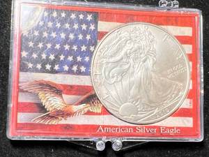 lot 53 image: 2010 AMERICAN SILVER EAGLE 1 TROY OZ .999 FINE SILVER IN CASE
