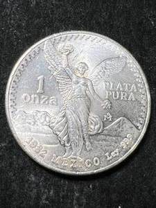lot 58 image: 1982 MEXICAN LIBERTAD 1 TROY OZ .999 FINE SILVER