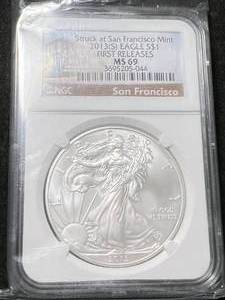 lot 71 image: 2013-S AMERICAN SILVER EAGLE NGC MS69 FIRST RELEASES