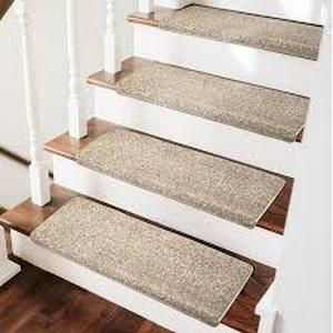 lot 34 image: PURE ERA Cream Grey 9.5 in. x 30 in. x 1.2 in. Polypropylene Bullnose Tape Free Non-slip Stair Tread Cover Carpet Mats Set of 14   Customer Returns See Pictures