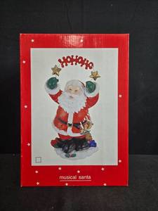 lot 19 image: Musical Santa Figurine Plays Frosty the Snowman