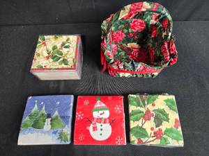 lot 29 image: Holiday Themed Fabric Basket with Assorted Christmas Napkins