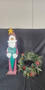 lot 57 image: Wooden Porch Santa Christmas Decor and Holiday Wreath Set