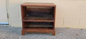 lot 67 image: Wooden Side Table with Open Shelves and Sliding Drawer, 23x24x16 Inches