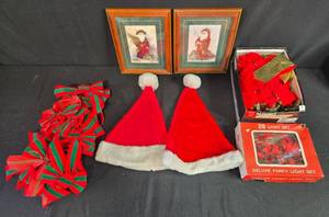 lot 81 image: Holiday Decor Lot with Santa Prints, Santa Hats, Bows, and Light Set