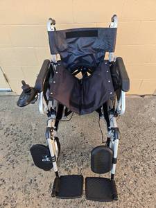 lot 87 image: Huweishen Electric Folding Wheelchair with Joystick Control - includes battery charger strength of battery unverified