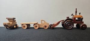 lot 102 image: Set of Handmade Wooden Toy Vehicles Trucks Planes and Tractors