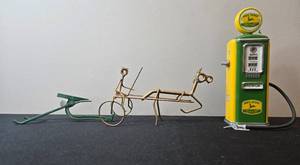 lot 104 image: Farm Collectibles Lot John Deere Gas Pump Bank, Wire Tractor Sculpture, and Plow Model