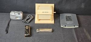 lot 116 image: Group of Miscellaneous Items Digital Camera, Leatherman Super Tool, Weather Station and Birdhouse