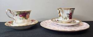 lot 128 image: Bone China Trio Elizabethan, Royal Albert, and Royal Tuscan Tea Cups and Plates