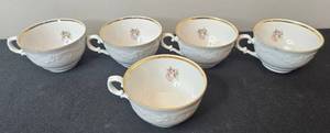 lot 130 image: Set of Schumann Arzberg Bavaria Wild Rose Porcelain Tea Cups