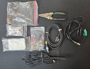 lot 134 image: Assorted Electrical Parts, Power Cords, and Wire Strippers Collection