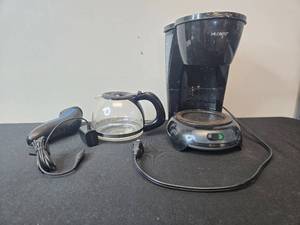 lot 136 image: Mr. Coffee Coffee Maker, Glass Carafe, and Philips Electric Shaver Set