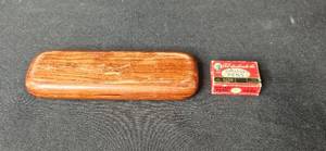 lot 140 image: Wooden Ballpoint Pen with Cadillac Logo Embossed on Front of Case & Vintage Esterbrook Dipless Pen Nibs Set