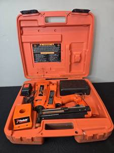 lot 148 image: Paslode IM250 II Cordless 16 Gauge Finish Nailer Kit with Case and Accessories