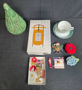 lot 178 image: Holiday Decor and Collectibles Lot with Winterling Teacup, Mauldin Sled Frame, Tree, Pins and Ornaments