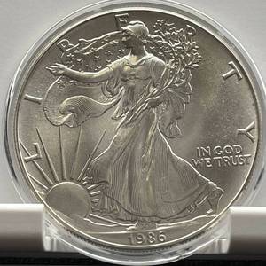 lot 34 image: 1986 American Silver Eagle (First Year)