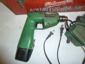 lot 57 image: Hitachi Cordless Drill In Milwaukee Box