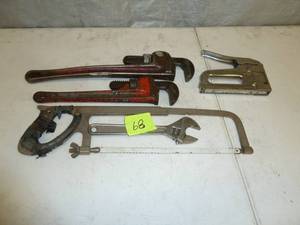 lot 68 image: Pipe Wrenches Hack Saw, Crescent Wrench, Stapler