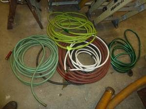 lot 107 image: Garden Hoses x 5