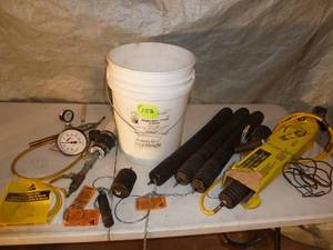 lot 153 image: Pail of Pressure Test Plugs