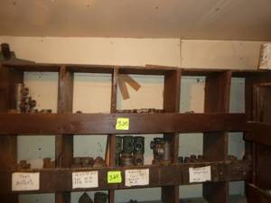 lot 320 image: Black Pipe Fittings Back Wall Bins