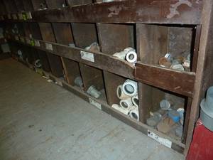lot 324 image: Galvanized Fittings Bottom 2 Rows of Bins