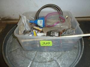 lot 329 image: Basket of Wolverine Sink Valves