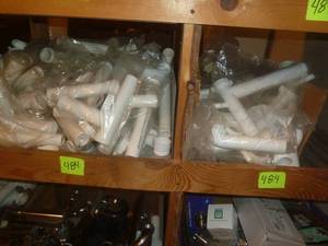 lot 484 image: Bin-PVC Drain Trap Sets, Dishwasher Drains