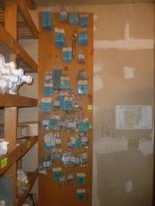 lot 485 image: Peg Board- American Standard Sink Repair Items