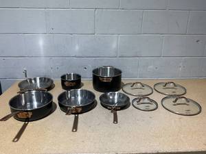 lot 37 image: Viking Cast Black Multi-Ply 3-Ply Black and Copper 10-Piece Cookware Set