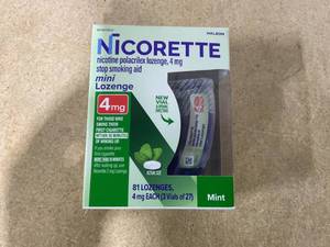 lot 257 image: Nicorette Mini Nicotine Lozenges to Stop Smoking, Mint Flavor, 4 mg - 81 Count