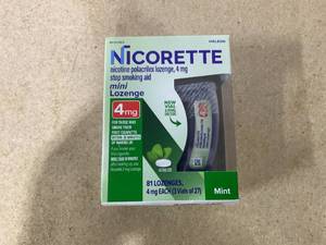 lot 258 image: Nicorette Mini Nicotine Lozenges to Stop Smoking, Mint Flavor, 4 mg - 81 Count