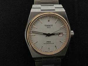 lot 6 image: Tissot PRX 40mm 316L stainless steel case with rose gold PVD coating Includes Bracelet Attachments