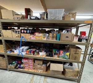 lot 86 image: Flash lights, can coolers, Rainbow Flame Crystals, Fire starters, Cutter mosquito wipes, Click-a-Lights, tumblers