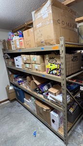 lot 94 image: Assorted toys Crayons, card games, Wacky Eyes, Squirt Camera, and more