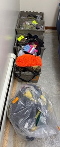 lot 108 image: Assorted hats, gloves, masks, Numb Skill Ice Towels, Motley Tubes. Note All merchandise is new