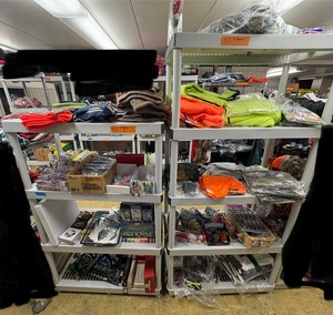 lot 117 image: Shirts, sweatshirts, shot glasses, blankets, wallets, winter hats, incense, decals, flash lights, bracelets